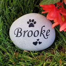 Load image into Gallery viewer, pet memorial stone. Personalized with a name, paw print and hearts. Natural river rock garden memorial or pet gravestone